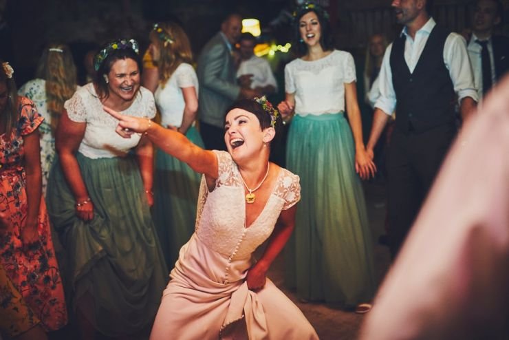 bride dancing at Devon wedding venue West Town Farm
