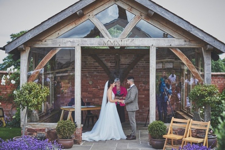 outdoor wedding ceremony photography Upton Barn and walled garden Devon