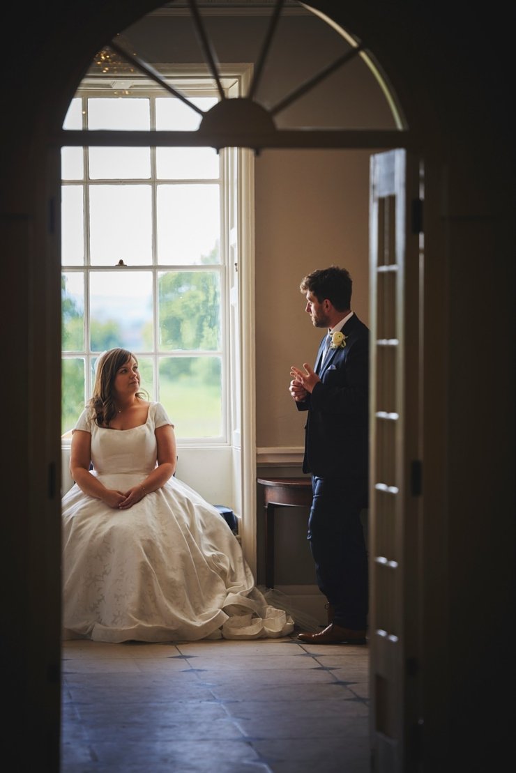 candid photo of couple at Rockbeare manor wedding