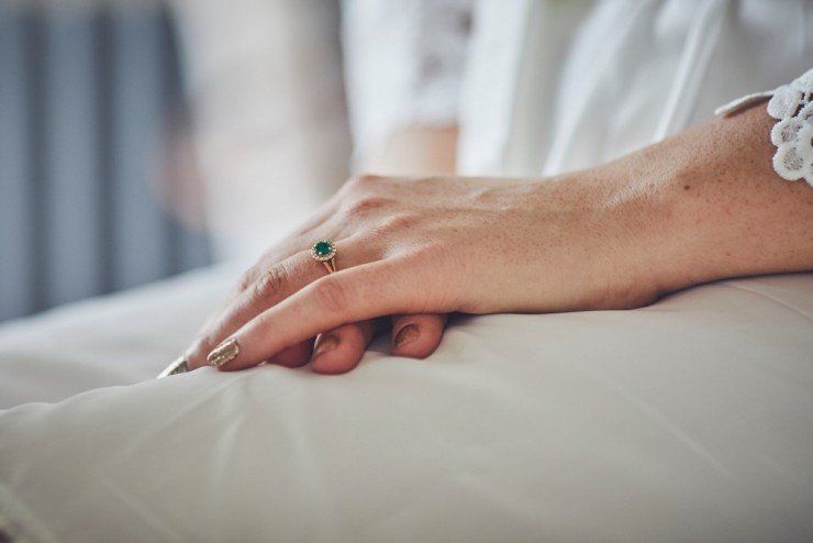 documentary wedding photography of wedding ring from team of two in devon at Rockbeare manor in Exeter