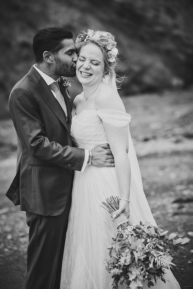 fun couples portrait at tunnels beaches 