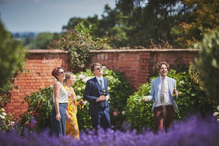 relaxed wedding photography Upton Barn and walled garden Devon