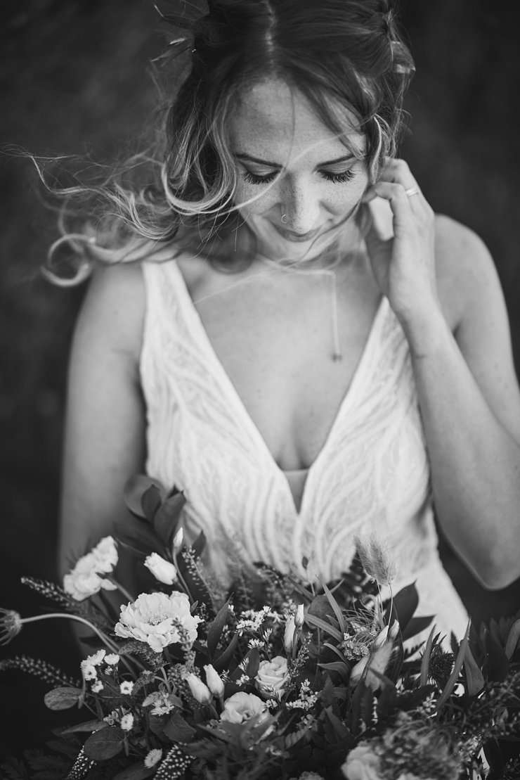 bride with long hair style and flowers at tunnels beaches 