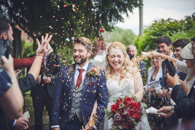 relaxed summer wedding photography at the corn barn near Cullompton in devon