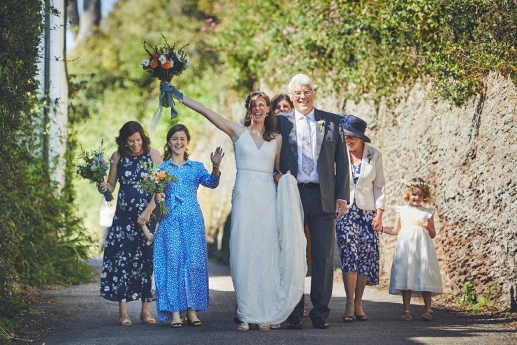 bridal procession waving at South Hams wedding