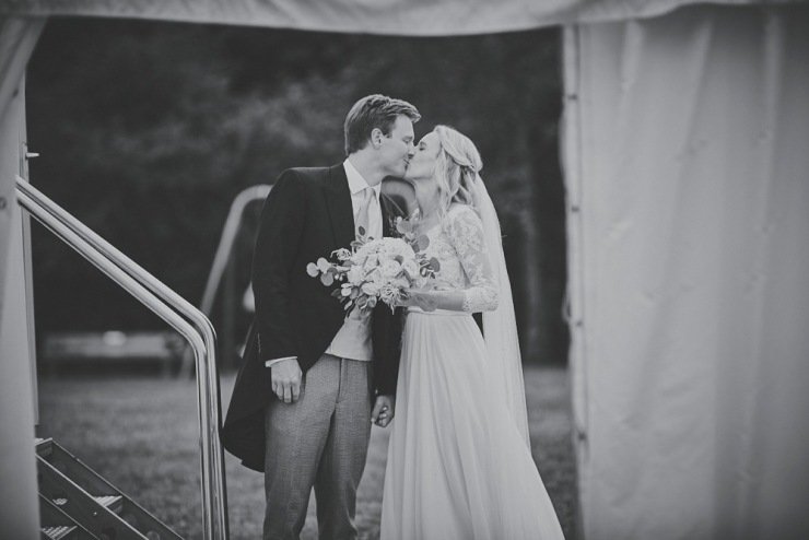 bride and groom make their entrance to devon marquee wedding reception