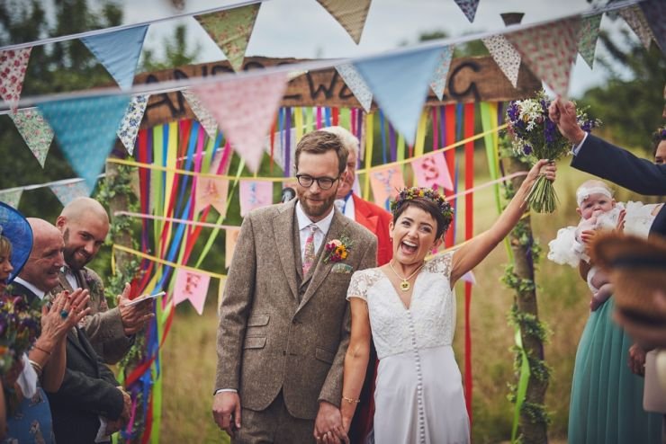 Just married happy couple at West Town Farm barn wedding photography devon