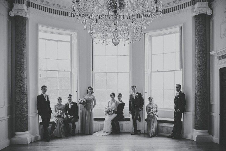 portrait wedding photography of bridal party and groomsmen at a rainy wedding at Rockbeare manor in Exeter devon