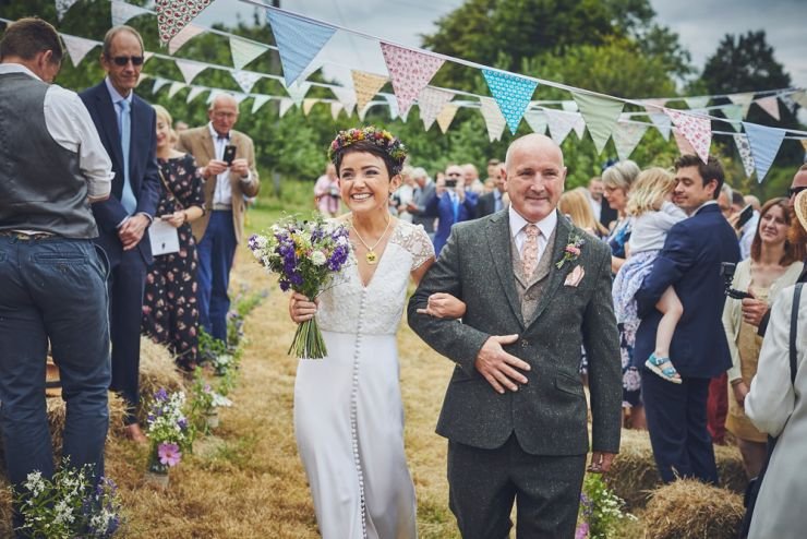 bride and dad walking down the aisle at Devon wedding 