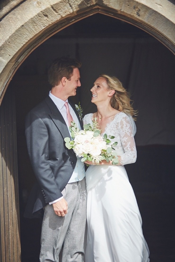 candid photography of confetti throw at Devon wedding