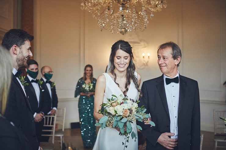 wedding photography of dad walking daughter down the aisle at small Rockbeare manor wedding