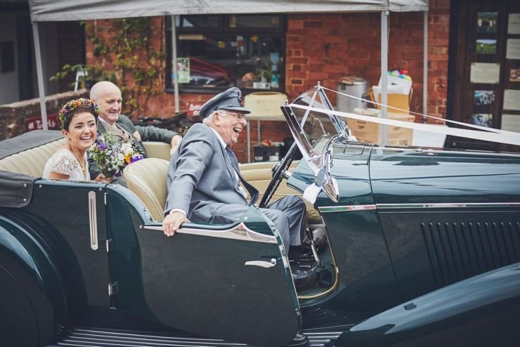 West Town Farm barn wedding photography of bride and father in vintage wedding car