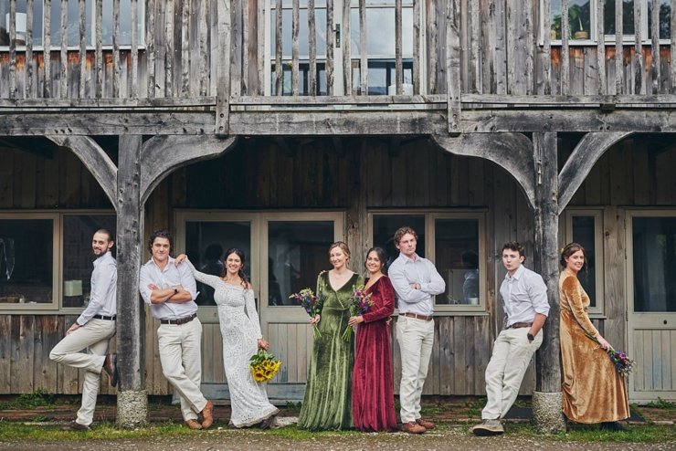 alternative wedding party photo at rustic hand tying wedding in Devon