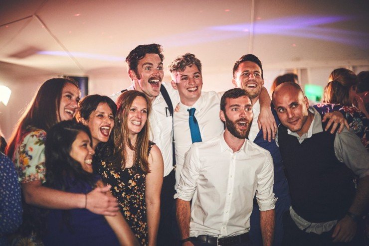 guests on dance floor in marquee wedding at South Allington House in Devon