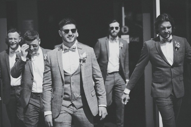 documentary wedding photography of the groom at Upton Barn and walled garden Devon