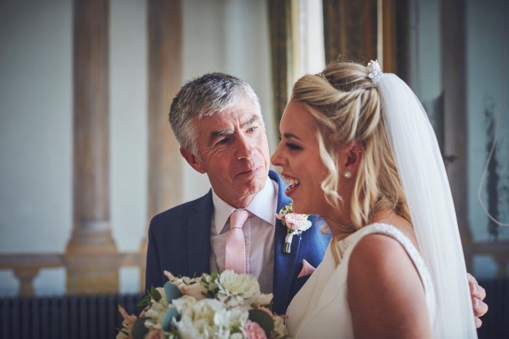 dad smiling at bride at Rockbeare manor in Exeter