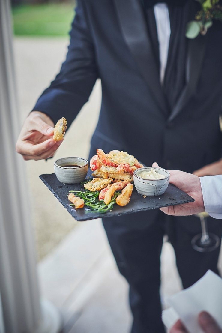 relaxed wedding photography of canapés at mini black tie wedding at Rockbeare Manor in Devon