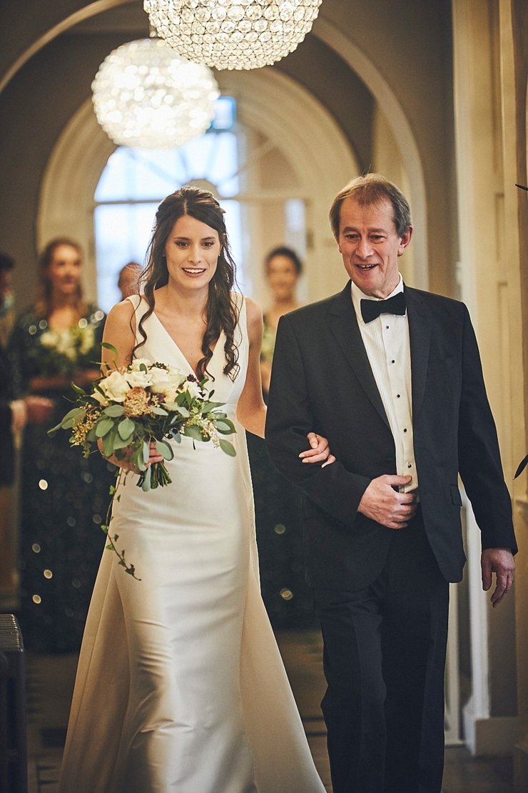 wedding photography of dad walking daughter down the aisle at small Rockbeare manor wedding