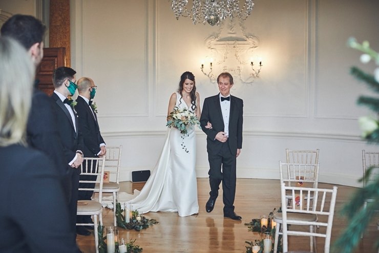 wedding photography of dad walking daughter down the aisle at small Rockbeare manor wedding